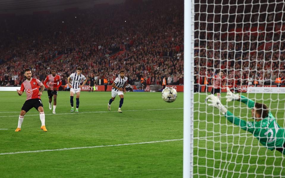 Adam Armstrong scores their third goal from the penalty spot