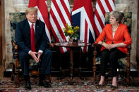 <p>Britain’s Prime Minister Theresa May poses for photographs with U.S. President Donald Trump at Chequers near Aylesbury, Britain, July 13, 2018. (Photo: Jack Taylor/Pool via Reuters) </p>