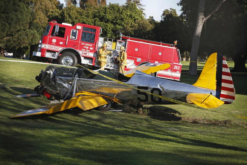 An airplane sits on the ground after crash landing at Penmar Golf Course in Venice, Los Angeles CA