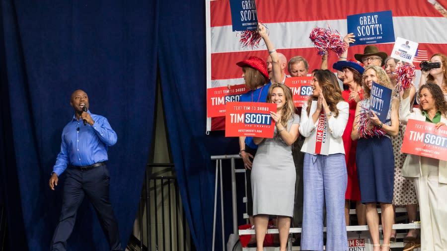 <em>Republican presidential candidate Tim Scott walks onto stage to deliver his speech announcing his candidacy for president of the United States. (AP Photo/Mic Smith)</em>