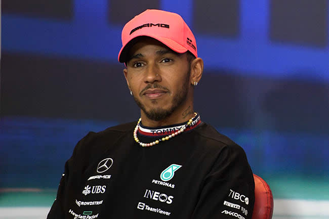 Lewis Hamilton sat in a chair