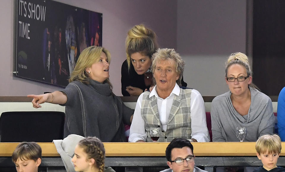 BELFAST, NORTHERN IRELAND - APRIL 29: Rod Stewart (R) and wife Penny Lancaster (L) and Rachel Hunter (C) with family members during the Ice Hockey Division 1B World Championship event at SSE Arena Belfast on April 29, 2017 in Belfast, Northern Ireland. (Photo by Charles McQuillan/Getty Images)