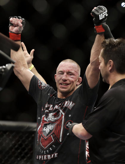 Georges St-Pierre celebrates his win. (AP)