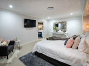 <p>The stylish master bedroom has a luxury en-suite with his and hers sinks and a double shower. Agents LJ Hooker Albany Creek said: “Absolutely no expense has been spared here as the current owners have totally transformed this property into an ultra-modern, chic and stylish acreage residence.” </p>