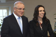 New Zealand's Prime Minister Jacinda Ardern, right, arrives with Australian Prime Minister Scott Morrison before bilateral talks in Melbourne, Australia, Friday, July 19, 2019. (Julian Smith/Pool Photo via AP)