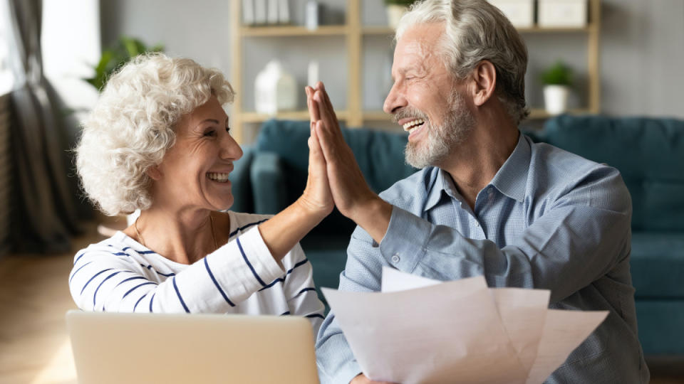 A retired couple is seen discussing finances.<p>ShutterStock</p>