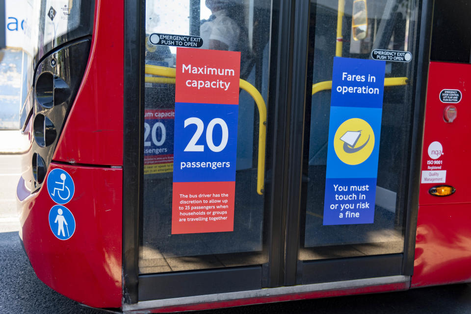  TFL London Bus with a sign restricting the amount of passengers allowed on to their buses to maintain social distancing. Only 10 passengers per single deck & 20 for a double deck bus (with the driver having the discretion to allow more passengers when households or groups are traveling together). (Photo by Dave Rushen / SOPA Images/Sipa USA) 