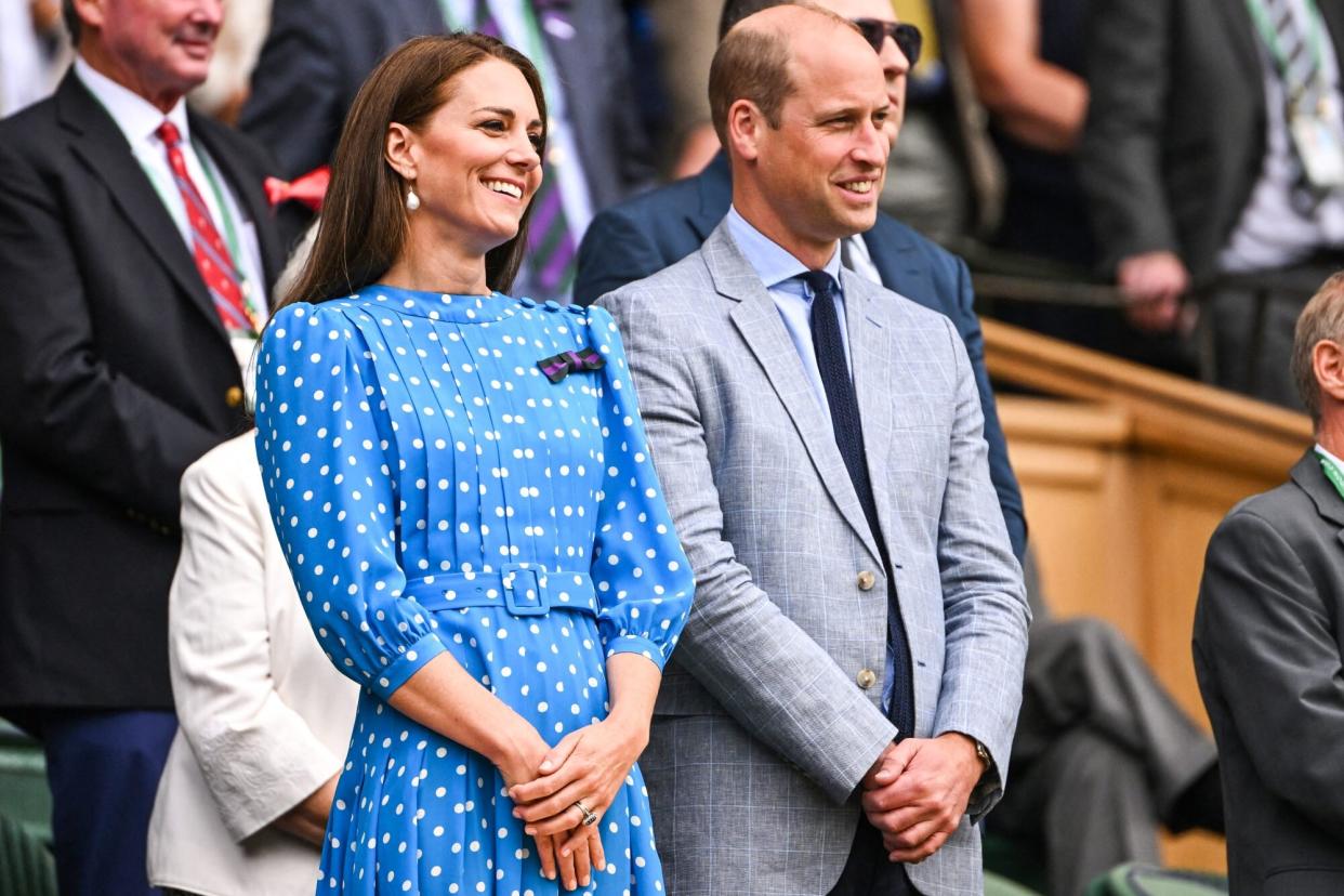 Princess Catherine and Prince William stand together at Wimbledon tennis match