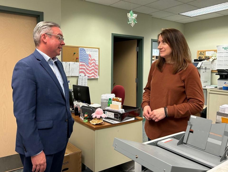 Pennsylvania Secretary of State Al Schmidt, left, discusses voting procedures and challenges with Tina Pritts, Somerset County's director of voter registration and elections, at her office in the County Building.