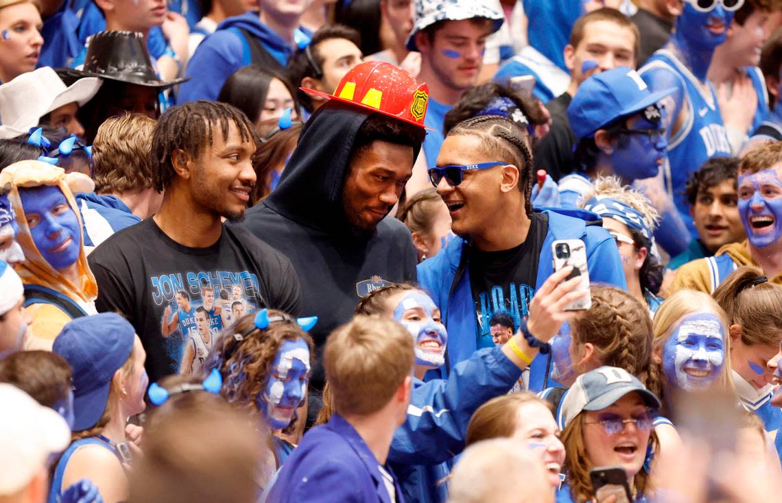 Duke’s Wendell Carter Jr., Mark Williams and Paolo Banchero hang out with the Cameron Crazies before Duke’s game against UNC at Cameron Indoor Stadium in Durham, N.C., Saturday, Feb. 4, 2023.