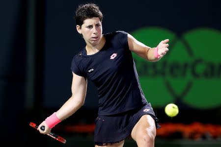 Mar 31, 2015; Key Biscayne, FL, USA; Carla Suarez Navarro hits a forehand against Venus Williams (not pictured) on day nine of the Miami Open at Crandon Park Tennis Center. Mandatory Credit: Geoff Burke-USA TODAY Sports