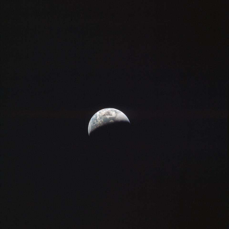 This April 1970 photo made available by NASA shows the Earth as the Apollo 13 crew traveled towards the moon. (NASA via AP)