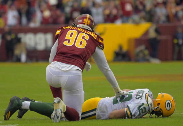 Aaron Rodgers Green Bay Packers Unsigned Running with Ball Photograph