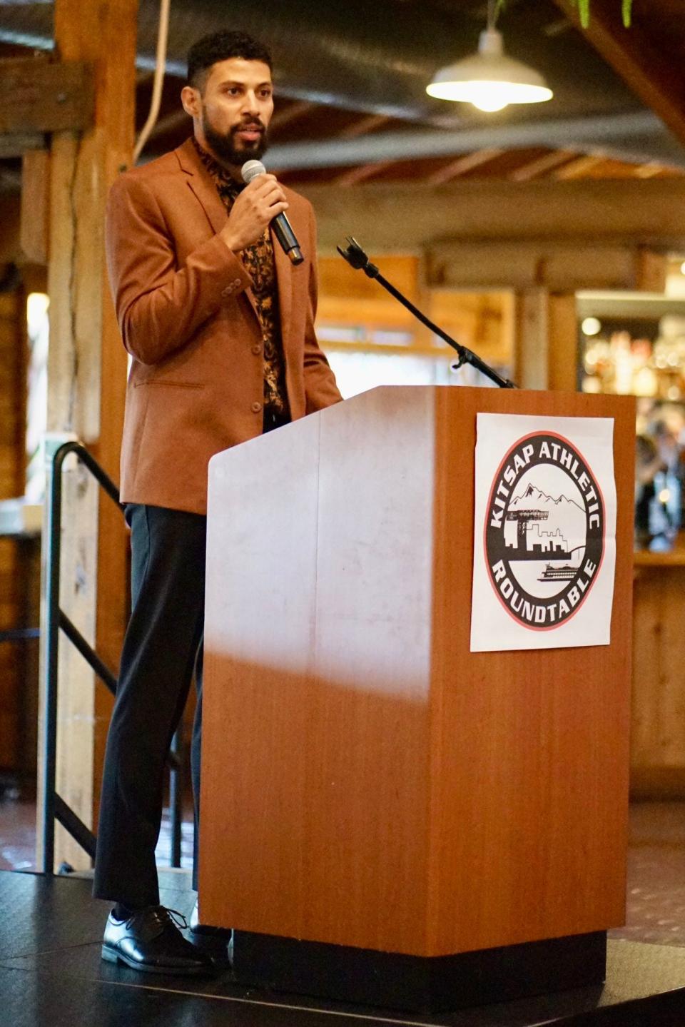 Steven Gray speaks to the crowd at Kiana Lodge during Saturday's Kitsap Sports Hall of Fame ceremony, which honored 2023 inductees.
