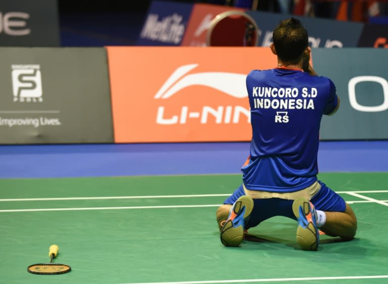 Sony Dwi Kuncoro of Indonesia celebrates his win against Lin Dan of China in the semi final at the Singapore Open on April 16, 2016