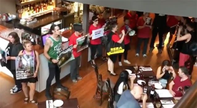 The activists were using loud speakers and yelling 'propaganda' relating to consumption of meat, according to the restaurant manager. Source: Facebook/Melbourne Cow Save