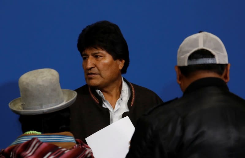 Bolivia's President Evo Morales looks on after adressing the media at the presidential hangar in the Bolivian Air Force terminal in El Alto