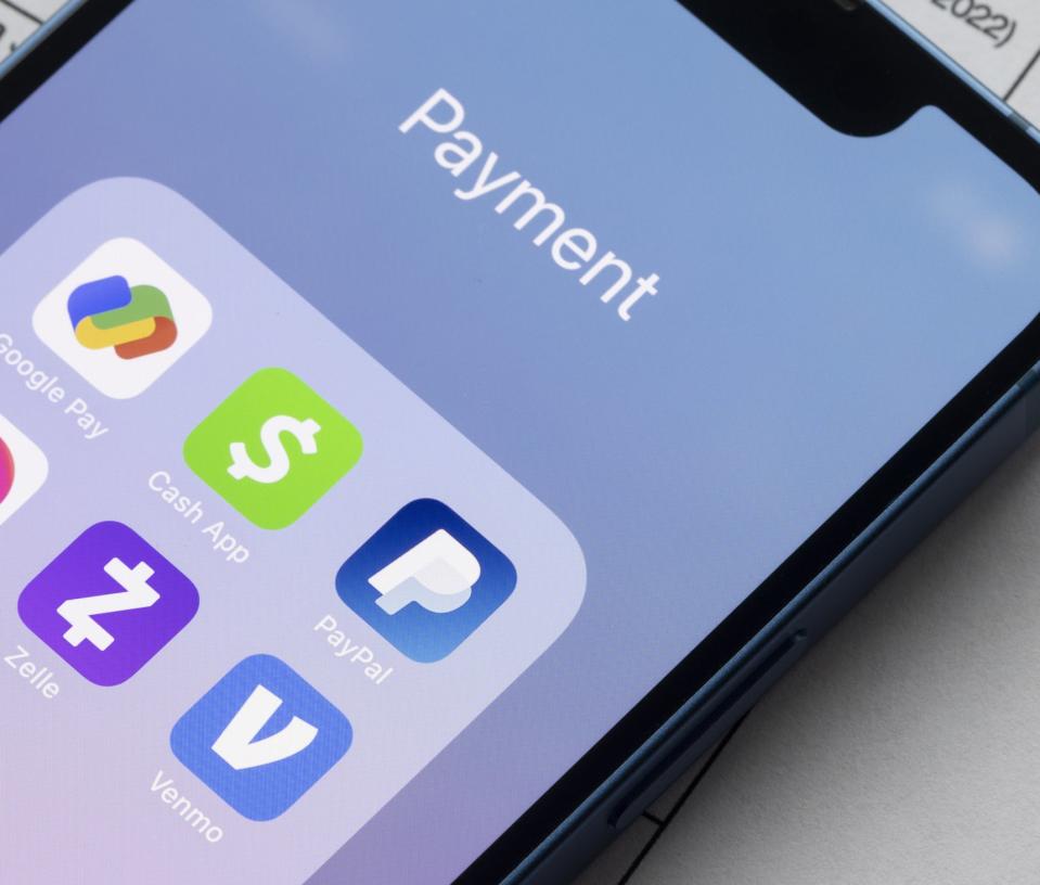 Payment apps like PayPal and Venmo are seen on an iPhone