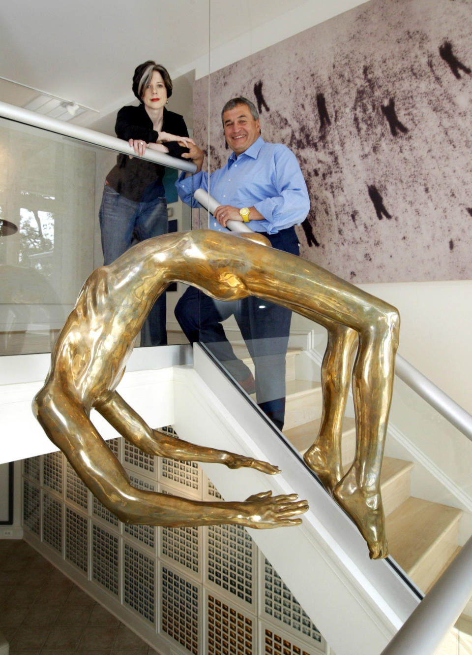 Tony Podesta and his now ex-wife Heather Podesta in front of The Arch of Hysteria by Louise Bourgeois, one of many expensive pieces of art purchased with Podesta's lobbying earnings. (Photo: The Washington Post via Getty Images)