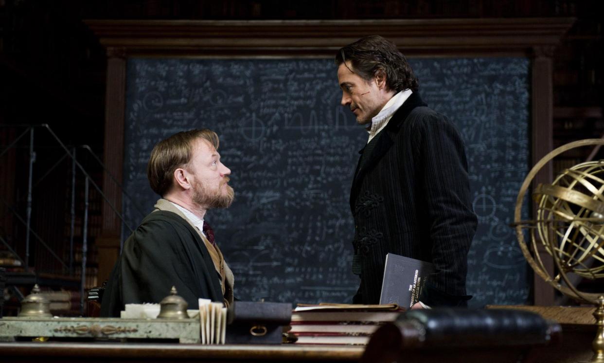 <span>Jared Harris as James Moriarty and Robert Downey Jr as Sherlock Holmes in Warner Bros’ 2011 Sherlock Holmes: A Game of Shadows. </span><span>Photograph: PictureLux/The Hollywood Archive/Alamy</span>