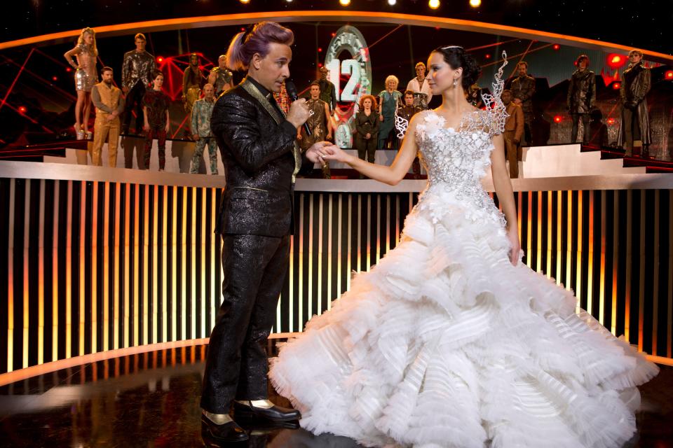 Stanley Tucci, left, and Jennifer Lawrence in a scene from 2013's dystopian adventure "The Hunger Games: Catching Fire."