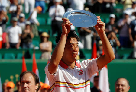 Tennis - ATP - Monte Carlo Masters - Monte-Carlo Country Club, Monte Carlo, Monaco - April 22, 2018 Japan's Kei Nishikori with the runners up trophy after the final against Spain's Rafael Nadal REUTERS/Eric Gaillard