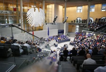 German Finance Minister Wolfgang Schaeuble (C) addresses a session of Germany's parliament, the Bundestag, in Berlin, Germany, August 19, 2015, prior to a vote on Greece's third bailout programme. REUTERS/Axel Schmidt