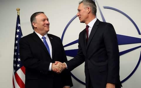 US Secretary of State Mike Pompeo poses with Nato Secretary General Jens Stoltenberg during a Nato foreign ministers meeting in Brussels. Nov 20, 2019. - Credit: REUTERS