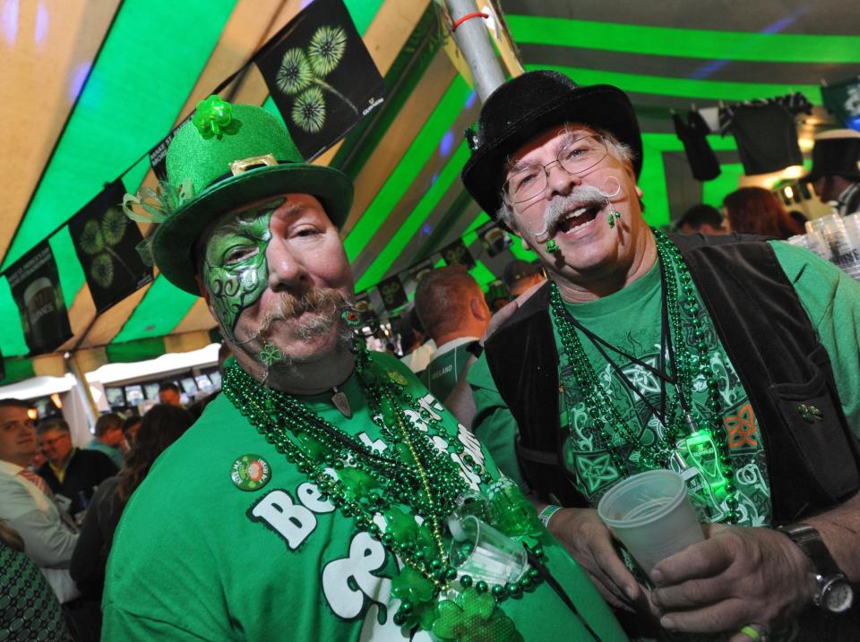 Mark Frank, left, and friend Rich Neil celebrate St. Patrick's Day at Culhane's Irish Pub in Atlantic Beach in 2014.