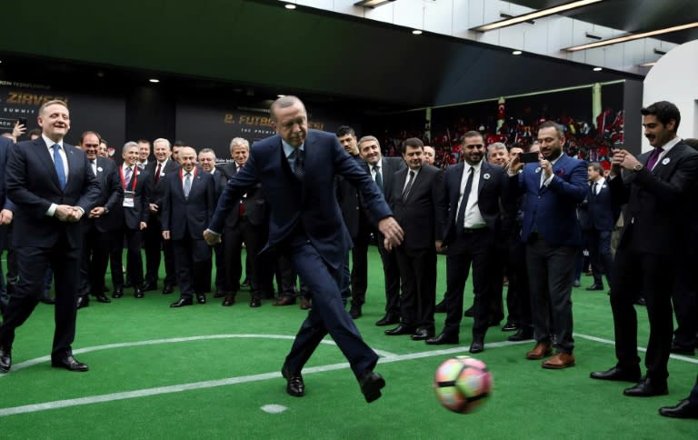 Yildirim Demiroren (2-L) is the president of the Turkish Football Federation and a regular visitor to the presidential palace