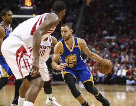 Jan 20, 2017; Houston, TX, USA; Golden State Warriors guard Stephen Curry (30) dribbles the ball during the third quarter against the Houston Rockets at Toyota Center. Mandatory Credit: Troy Taormina-USA TODAY Sports