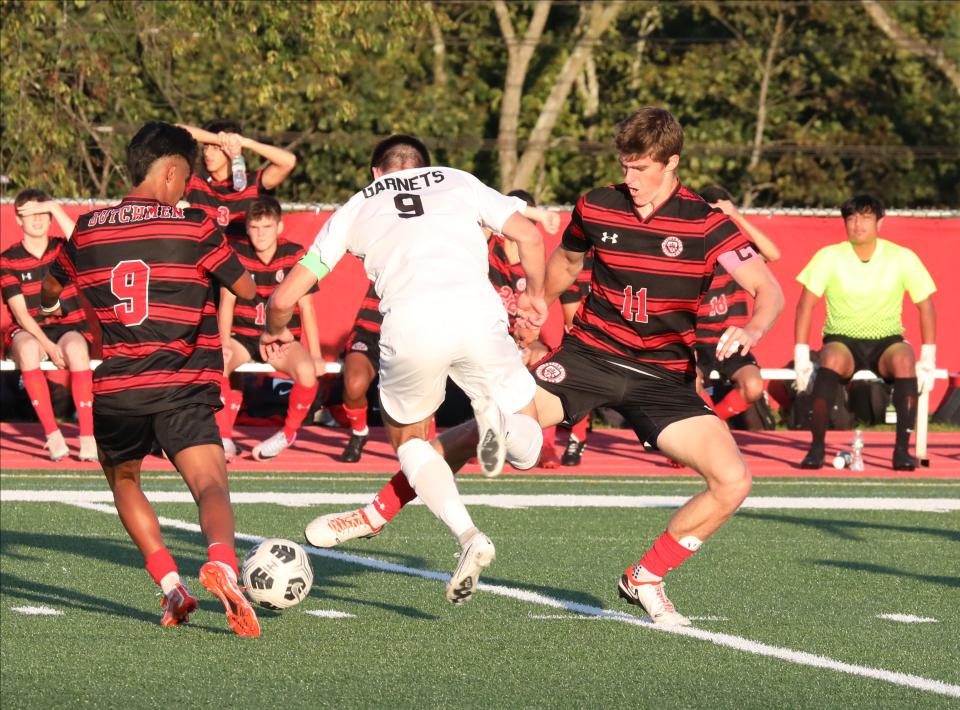 Tappan Zee's Jack Kryger (11) battles for the ball in front of Rye's Tommy Broderick (9) during their boys soccer game at Tappan Zee High School, Sept. 19, 2023.