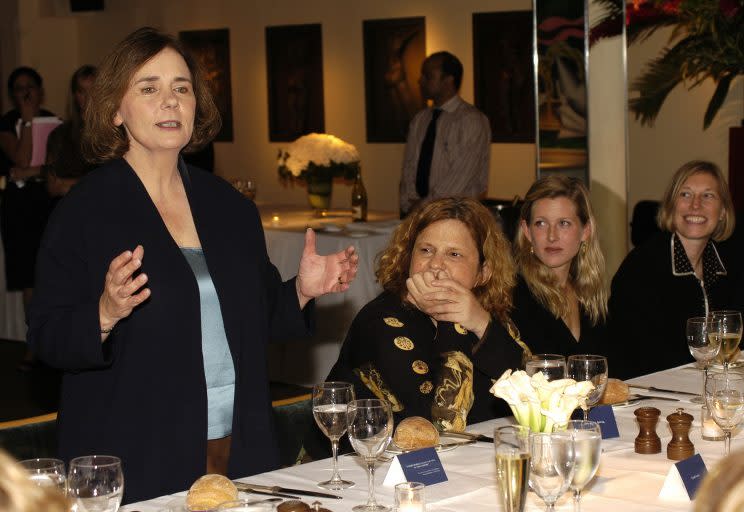 Author Gail Collins speaks as Wendy Wasserstein and Karenna Gore Schiff look on at a dinner marking the publication of Collins' book 'America's Women: 400 Years of Dolls, Druges, Helpmates, and Heroines' at Michaels Restaurant September 25, 2003 in New York City. 