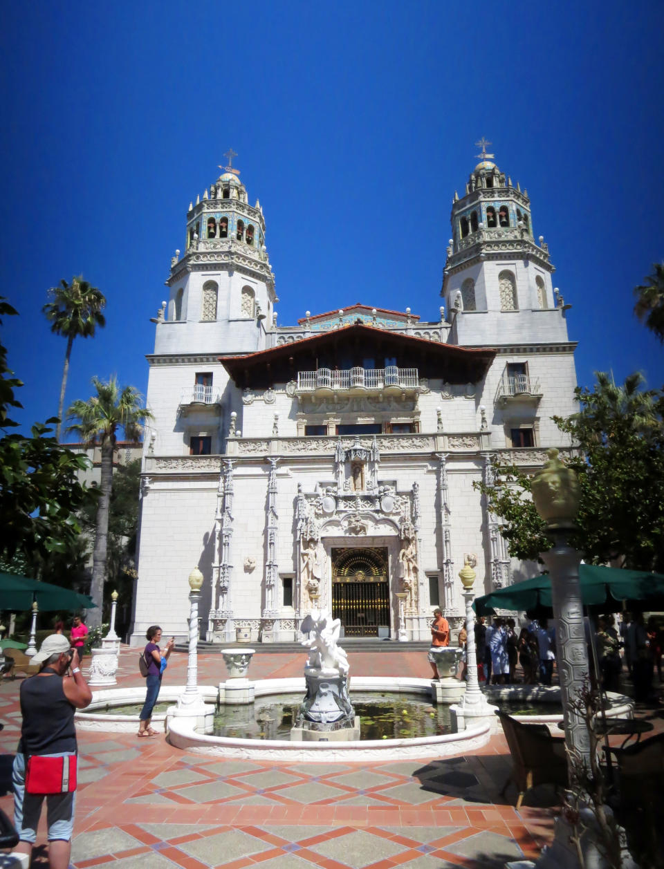 This Aug. 30, 2013 photo shows the exterior of Hearst Castle, the 165-room estate of newspaper publisher William Randolph Hearst, in San Simeon, Calif. Visitors can tour the estate which he called "La Cuesta Encantada" ("The Enchanted Hill"), that overlooks the Pacific Ocean. (AP Photo/Jim MacMillan)