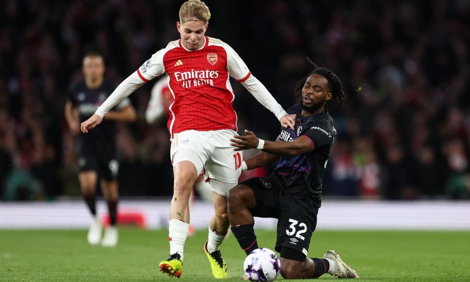 <span>Emile Smith Rowe in the thick of the action, battling with <a class="link " href="https://sports.yahoo.com/soccer/players/383263/" data-i13n="sec:content-canvas;subsec:anchor_text;elm:context_link" data-ylk="slk:Fred Onyedinma;sec:content-canvas;subsec:anchor_text;elm:context_link;itc:0">Fred Onyedinma</a>. The Arsenal midfielder showed his class on a rare start.</span><span>Photograph: Jacques Feeney/Offside/Getty Images</span>