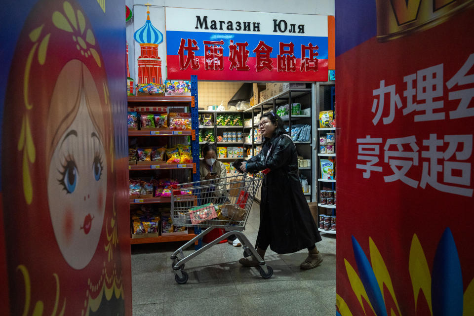 A customer at an Epinduo supermarket in Heihe, China (Bloomberg via Getty Images file)