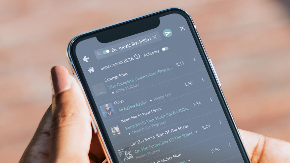 A phone showing results from Volumio's SuperSearch AI-powered feature, where someone has asked for 'music like Billie Holiday' and several suggested songs are shown