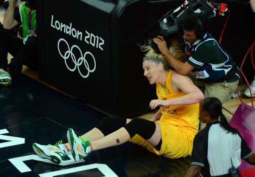 Australian centre Lauren Jackson falls to the ground during the London 2012 Olympic Games women's bronze medal basketball game between Australia and Russia at the North Greenwich Arena in London. Jackson scored 25 points and grabbed 11 rebounds to lead Australia to a women's basketball medal for the fifth Olympics in a row as the Opals beat Russia 83-74 in the bronze-medal game