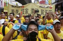 Supporters of pro-democracy group "Bersih" (Clean) gather along Jalan Tun Perak in Malaysia's capital city of Kuala Lumpur August 29, 2015. REUTERS/Edgar Su