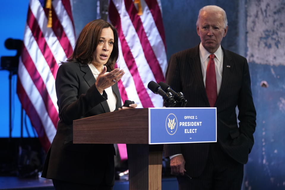 Vice President-elect Kamala Harris, accompanied by President-elect Joe Biden, speaks at The Queen theater, Thursday, Nov. 19, 2020, in Wilmington, Del. (AP Photo/Andrew Harnik)