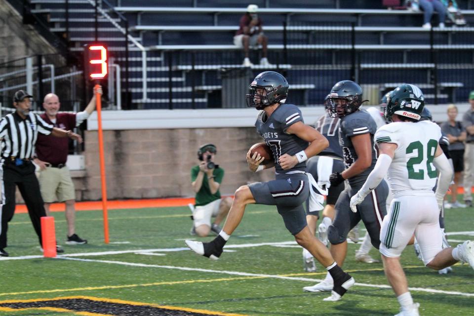 Savannah (Ga.) Benedictine Military School quarterback Luke Kromenhoek, who is verbally committed to Florida State's 2024 recruiting class, finds the end zone for a rushing touchdown against Westminster.