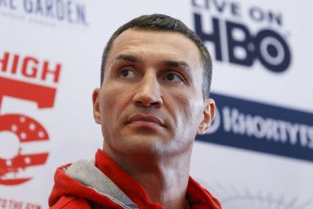 Reigning heavyweight champion Wladimir Klitschko of Ukraine takes part in a news conference with challenger Bryant Jennings of the U.S. ahead of their fight in New York April 21, 2015. REUTERS/Shannon Stapleton