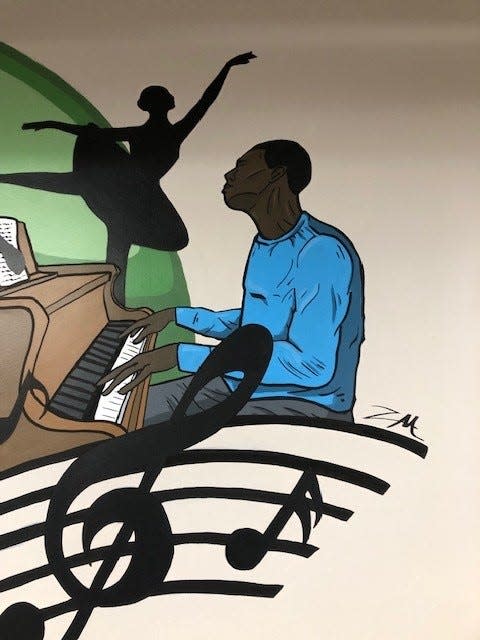 Zachary McChristy, a junior at Ontario High School, spent four weeks working on his new mural at Richland Academy of the Arts.