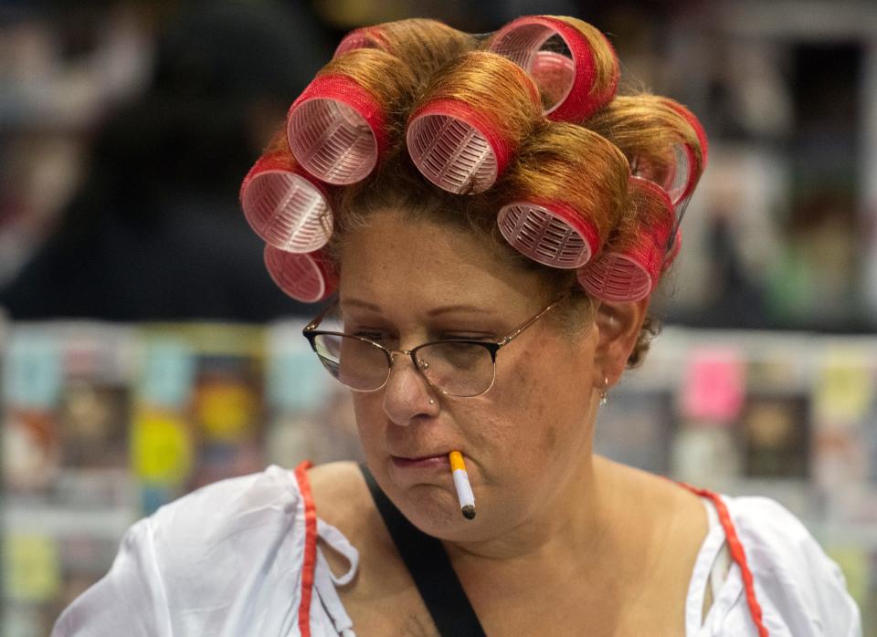 Sonia So of Stockton dressed as the landlady from Kung Fu Hustle at the annual StocktonCon at the Stockton Arena in downtown Stockton on Saturday, August, 13, 2022. 