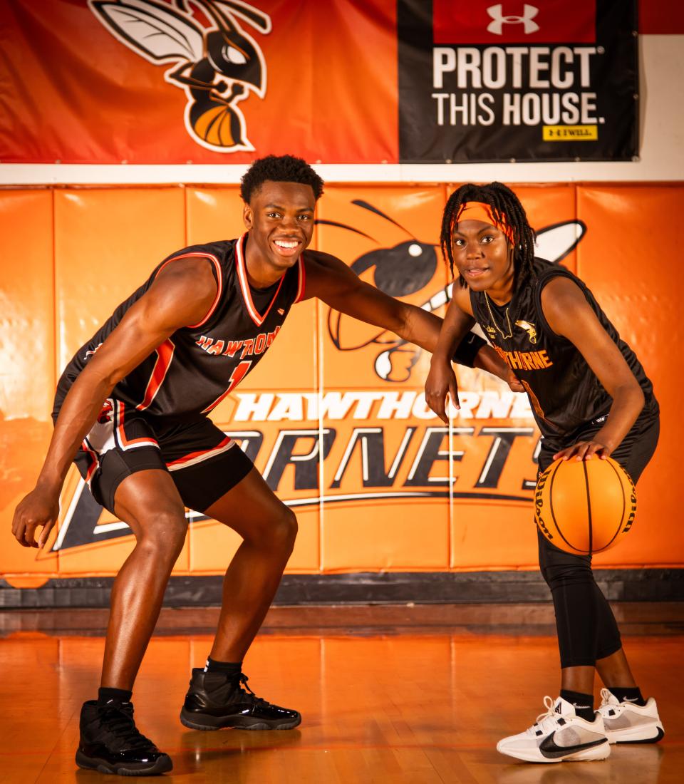 Hawthorne High School’s CJ Ingram, left, is this year’s Gainesville Sun Boys Basketball Player of the Year while Hawthorne High School’s De'Mya Adams, right, is this year’s Gainesville Sun Girls Basketball Player of the Year. Ingram, 16 and a junior, plays point guard for the Hornets. Ingram scored close to 500 points this year for the Hornets. Adams, 17 and a junior, plays both shooting and point guard for the Hornets. The team won the Basketball State Championship two years in a row. [Doug Engle/Ocala Star Banner]2024