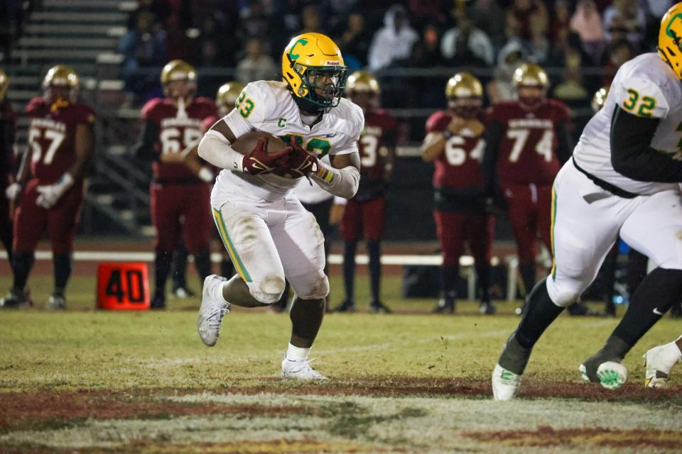 Pensacola Catholic's Nigel Nelson (23) runs up the field during the Crusaders' 17-10 win at Florida State University High School on Friday, Nov. 24, 2023, in the Region 1-2S Championship game at FSUHS in Tallahassee.