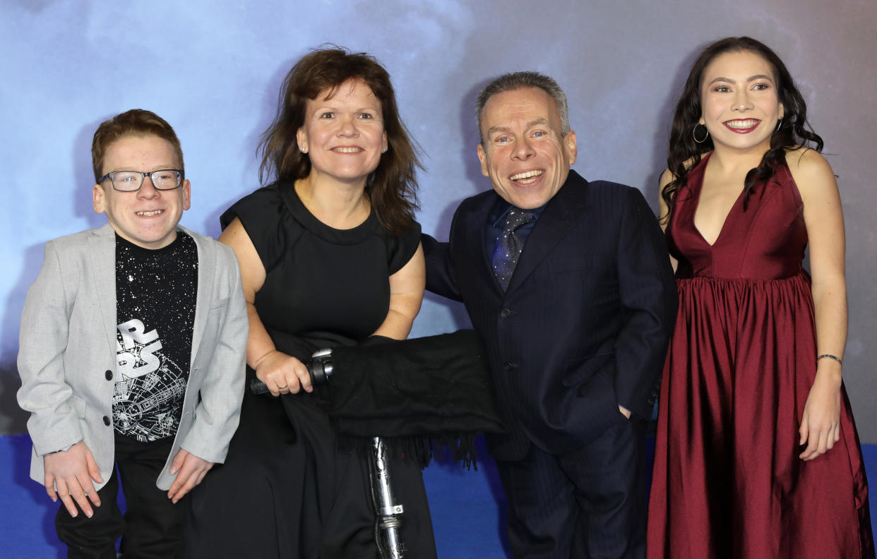 Harrison Davis, Samantha Davis, Warwick Davis and Annabelle Davis attend the 