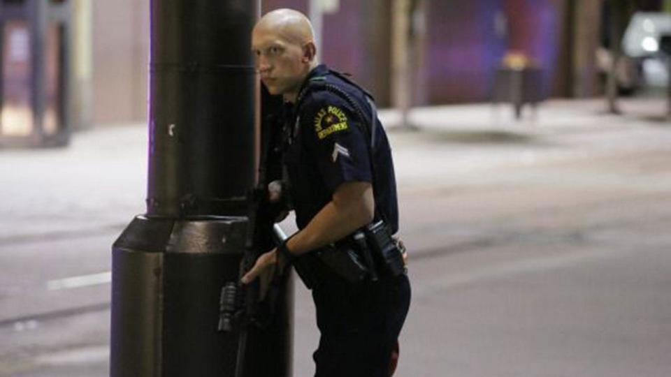 Armed policeman on the lookout