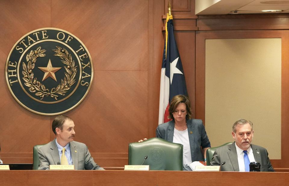 Rep. Andrew Murr, R - Junction, Chair of the House General Investigating Committee, left to right, Rep. Ann Johnson, D - Houston, and Rep. David Spiller, R - Jacksboro, get ready to leave after the meeting where it was recommended that the committee adopt the articles of impeachment against Attorney General Ken Paxton at the Capitol on Thursday May 25, 2023.