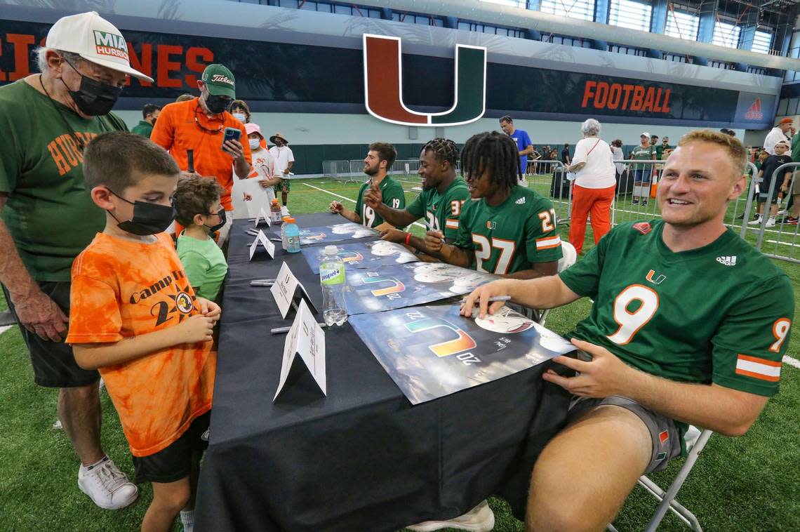 Miami Hurricanes quarterback Tyler Van Dyke and fellow players were available for autographs at Carol Soffer Indoor Practice Facility during CanesFest at the University of Miami in Coral Gables on Saturday, August 6, 2022.